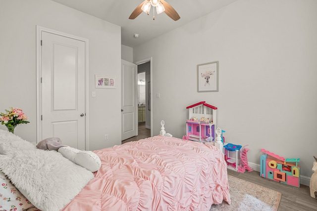 381 Oak Meadow Ln, Weatherford, TX 76085 - bedroom featuring wood finished floors, baseboards, and ceiling fan