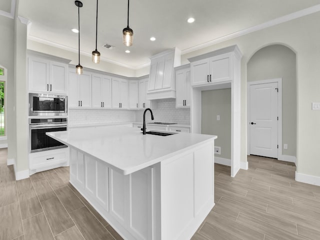 161 Altom Rd, Springtown, TX 76082 - kitchen with appliances with stainless steel finishes, backsplash, a sink, light countertops, and baseboards