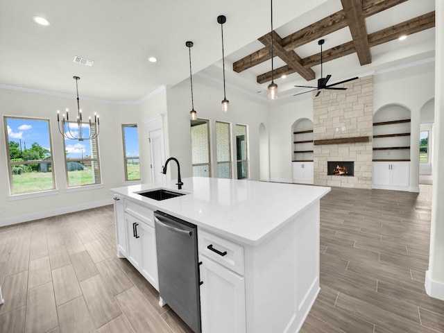 161 Altom Rd, Springtown, TX 76082 - kitchen featuring dishwasher, a sink, a chandelier, coffered ceiling, and wood finish floors