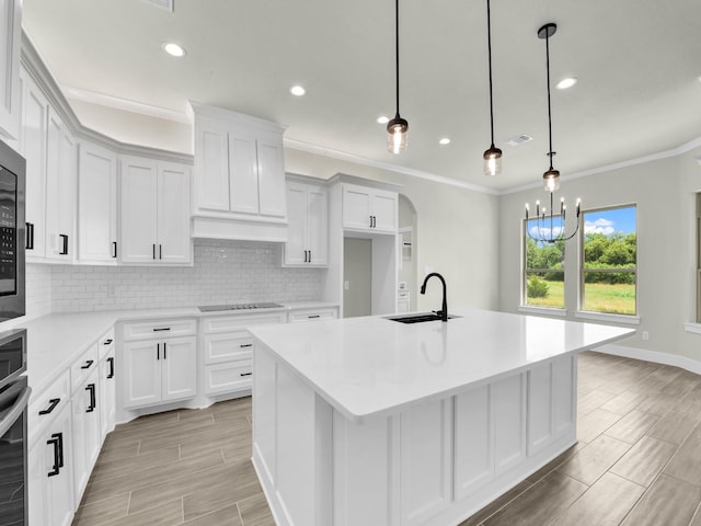 161 Altom Rd, Springtown, TX 76082 - kitchen with a sink, decorative backsplash, light countertops, white cabinetry, and recessed lighting