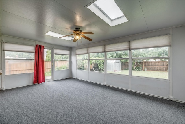2315 Yale Dr, Arlington, TX 76015 - unfurnished sunroom featuring ceiling fan, a skylight, and carpet flooring