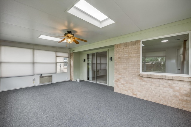 2315 Yale Dr, Arlington, TX 76015 - unfurnished sunroom with a skylight and a wall mounted air conditioner
