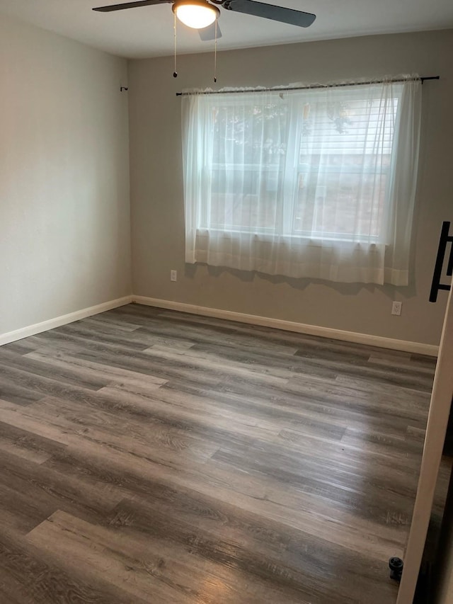 1605 Baltimore Dr, Richardson, TX 75081 - spare room with ceiling fan, healthy amount of natural light, and dark wood-style floors