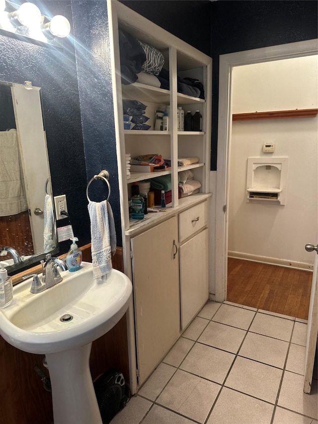 567 N Rice, Hamilton, TX 76531 - bathroom with tile patterned floors and a sink
