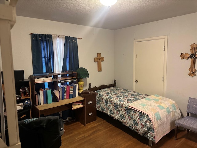567 N Rice, Hamilton, TX 76531 - bedroom with wood finished floors