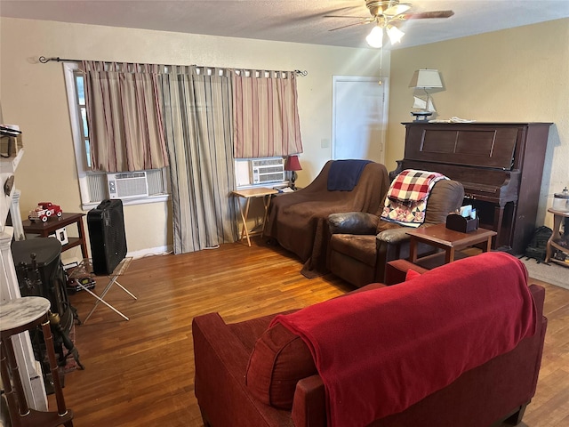 567 N Rice, Hamilton, TX 76531 - living area with wood finished floors, a ceiling fan, and cooling unit