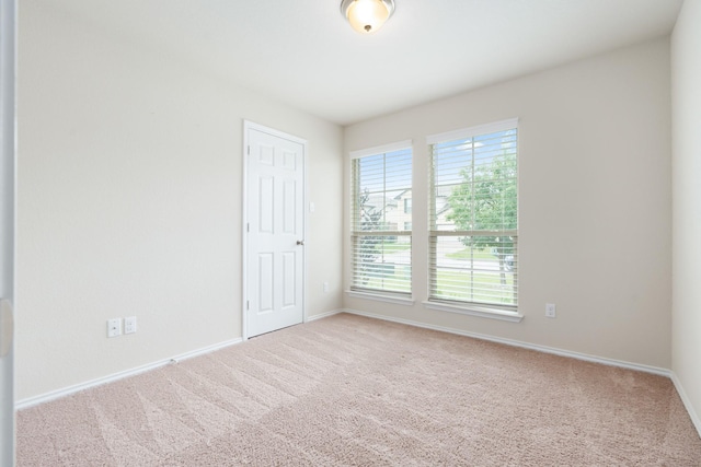 3216 Jackal Dr, Lorena, TX 76655 - spare room featuring plenty of natural light, carpet flooring, and baseboards
