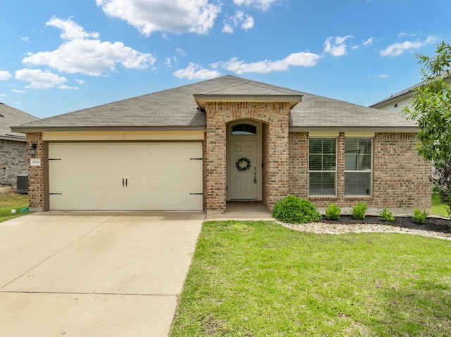 3216 Jackal Dr, Lorena, TX 76655 - ranch-style house with central AC, driveway, a garage, brick siding, and a front yard
