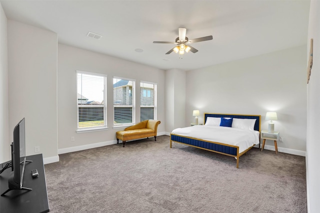 7216 Monet Ln, Grand Prairie, TX 75054 - carpeted bedroom with baseboards and a ceiling fan