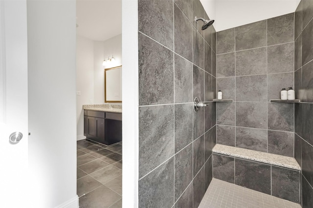 7216 Monet Ln, Grand Prairie, TX 75054 - full bath with a tile shower, vanity, and tile patterned floors