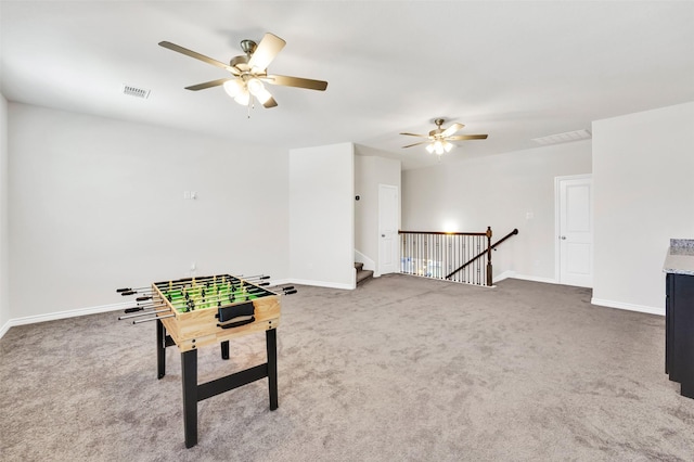 7216 Monet Ln, Grand Prairie, TX 75054 - recreation room featuring a ceiling fan, carpet flooring, and baseboards