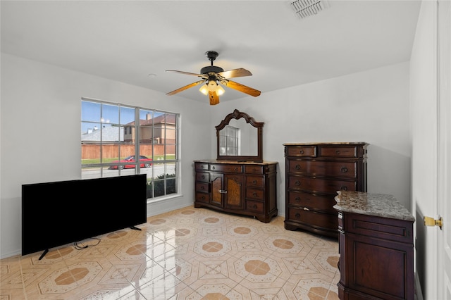 6745 Bear Hollow Ln, Watauga, TX 76137 - bedroom with a ceiling fan and baseboards