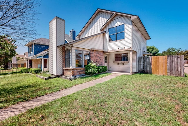 205 Callender Dr, Fort Worth, TX 76108 - view of front of home featuring brick siding and a chimney