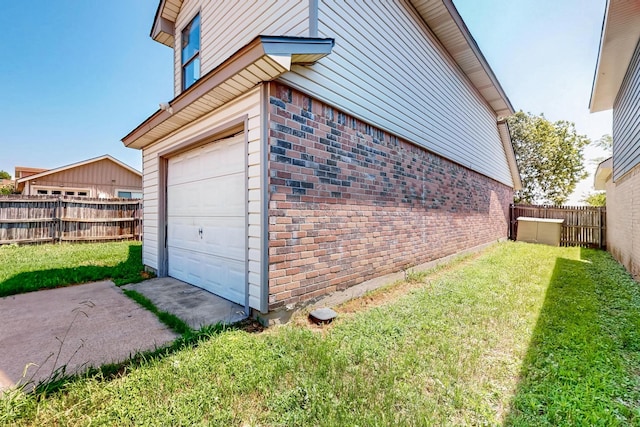 205 Callender Dr, Fort Worth, TX 76108 - view of home's exterior featuring brick siding and a garage