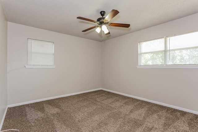 5113 Bob Dr, North Richland Hills, TX 76180 - carpeted spare room with baseboards and ceiling fan