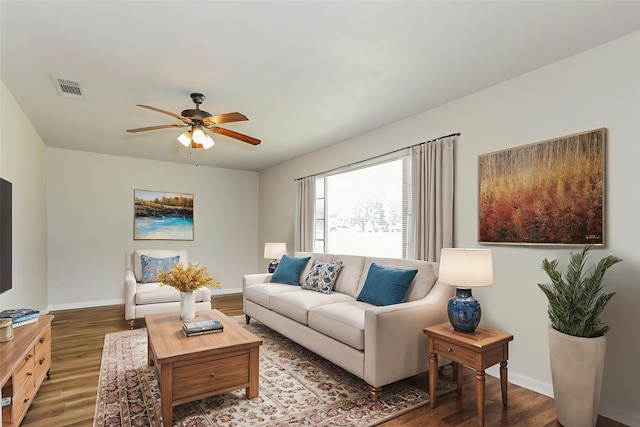 5113 Bob Dr, North Richland Hills, TX 76180 - living area featuring a ceiling fan, wood finished floors, and baseboards