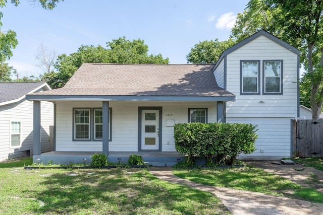 2835 Gladstone Dr, Dallas, TX 75211 - view of front of property with covered porch and a shingled roof