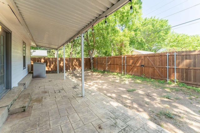 2835 Gladstone Dr, Dallas, TX 75211 - fenced backyard featuring a patio and a gate