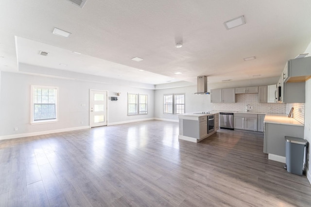 2835 Gladstone Dr, Dallas, TX 75211 - unfurnished living room featuring a sink, baseboards, and dark wood-style floors