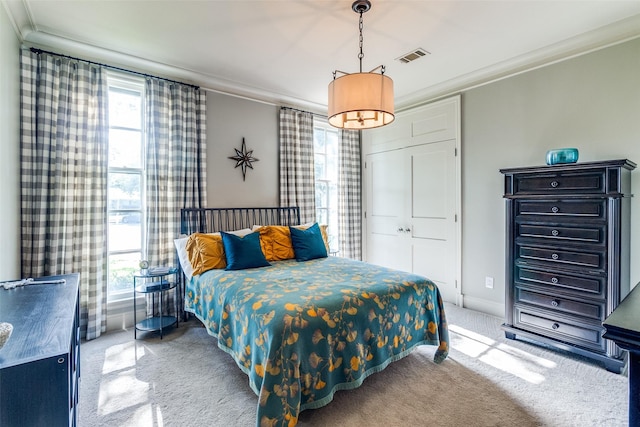 3241 Merrell Cir, Dallas, TX 75229 - bedroom with carpet floors, crown molding, baseboards, and a closet