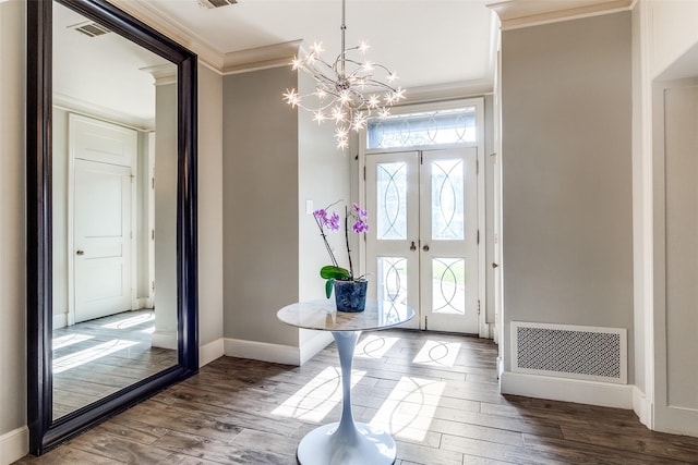 3241 Merrell Cir, Dallas, TX 75229 - foyer entrance featuring ornamental molding, a chandelier, healthy amount of natural light, baseboards, and wood finished floors