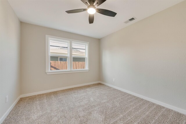 4955 Odessa Ave, Fort Worth, TX 76133 - unfurnished room with carpet, baseboards, and ceiling fan