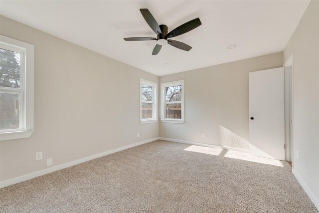 4955 Odessa Ave, Fort Worth, TX 76133 - carpeted empty room with a ceiling fan and baseboards