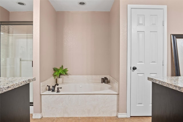 483 County Road 1591, Sunset, TX 76270 - full bath featuring vanity, a bath, tile patterned flooring, a stall shower, and baseboards