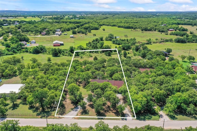 483 County Road 1591, Sunset, TX 76270 - aerial view of property's location with property boundaries highlighted and a forest