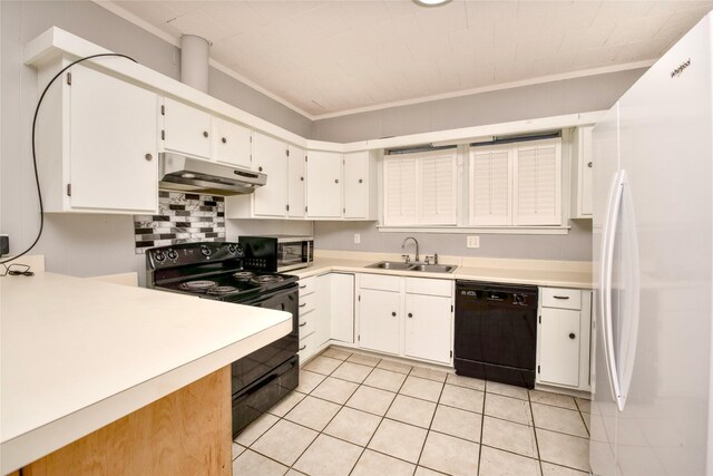 307 Smith St, Hillsboro, TX 76645 - kitchen with black appliances, under cabinet range hood, a sink, crown molding, and light tile patterned floors