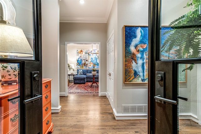 10 Carmarthen Ct, Dallas, TX 75225 - hallway with ornamental molding, wood finished floors, and baseboards