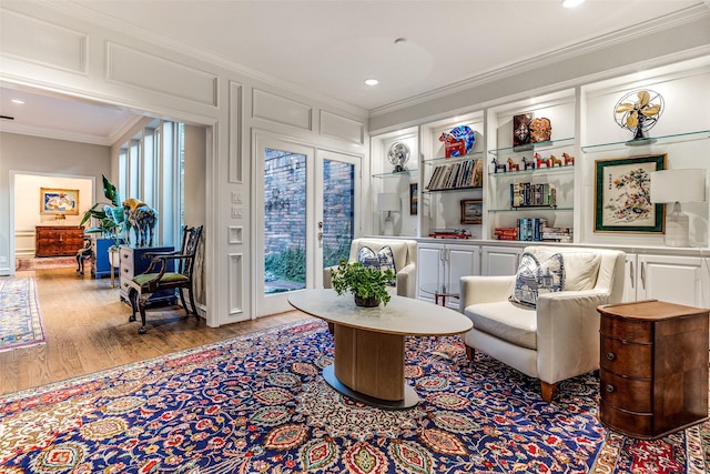 10 Carmarthen Ct, Dallas, TX 75225 - living area with ornamental molding, wood finished floors, recessed lighting, and healthy amount of natural light