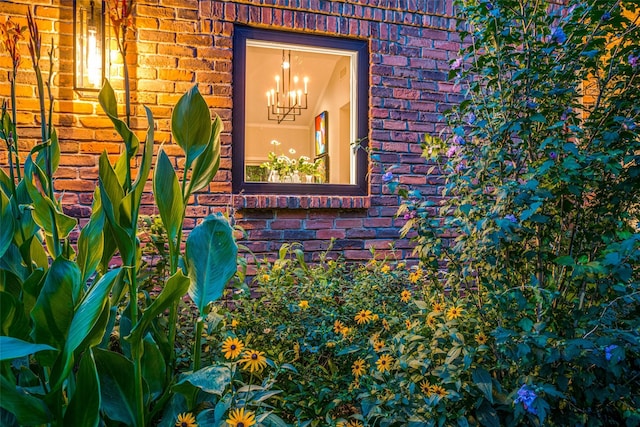 10 Carmarthen Ct, Dallas, TX 75225 - detailed view of brick siding and a chandelier