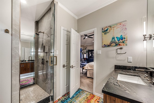 10 Carmarthen Ct, Dallas, TX 75225 - ensuite bathroom with crown molding, vanity, a stall shower, and ceiling fan