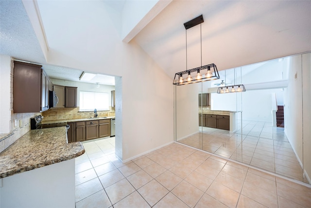 6900 Tudor Dr, Plano, TX 75023 - unfurnished dining area with a sink, light tile patterned flooring, high vaulted ceiling, and baseboards