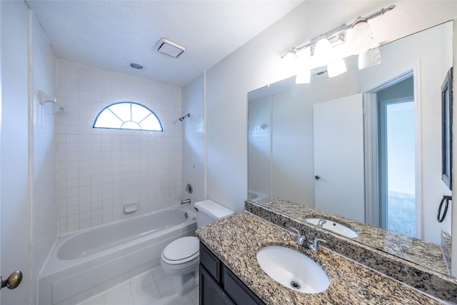 6900 Tudor Dr, Plano, TX 75023 - bathroom featuring bathing tub / shower combination, vanity, toilet, tile patterned floors, and a textured ceiling