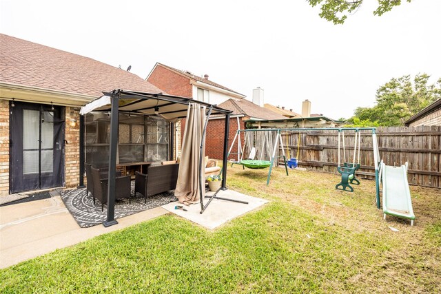6900 Tudor Dr, Plano, TX 75023 - view of yard with a patio area, a playground, and an outdoor hangout area