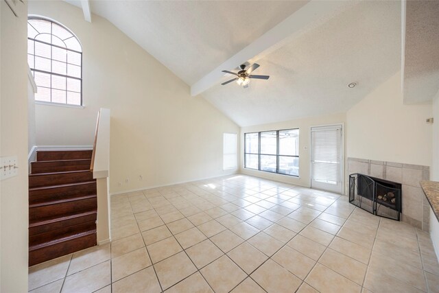 6900 Tudor Dr, Plano, TX 75023 - unfurnished living room with ceiling fan, plenty of natural light, and light tile patterned flooring