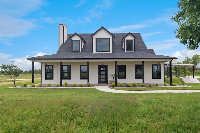 669 Massey Rd, Gunter, TX 75058 - view of front of house with a chimney, a porch, a front yard, and roof with shingles