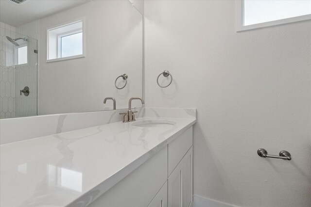 669 Massey Rd, Gunter, TX 75058 - bathroom with vanity and a tile shower