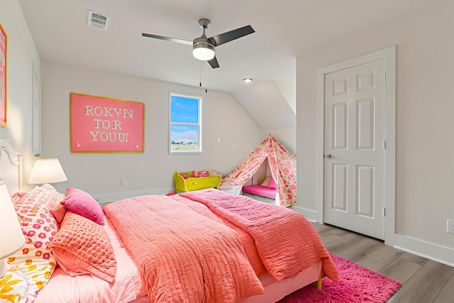 669 Massey Rd, Gunter, TX 75058 - bedroom with baseboards, wood finished floors, lofted ceiling, and ceiling fan