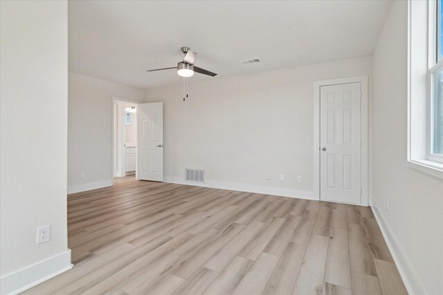 669 Massey Rd, Gunter, TX 75058 - unfurnished room featuring a ceiling fan, light wood-style flooring, and baseboards