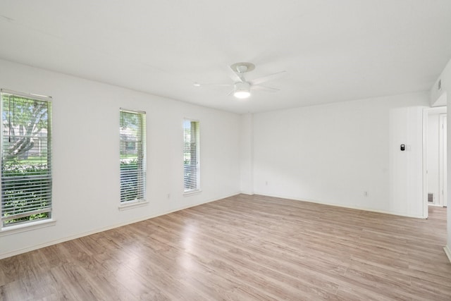 4016 Willow Ridge Dr, Dallas, TX 75244 - unfurnished room featuring light wood-style flooring, healthy amount of natural light, and ceiling fan