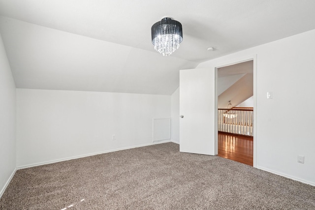 4016 Willow Ridge Dr, Dallas, TX 75244 - bonus room featuring carpet flooring, lofted ceiling, a chandelier, and baseboards