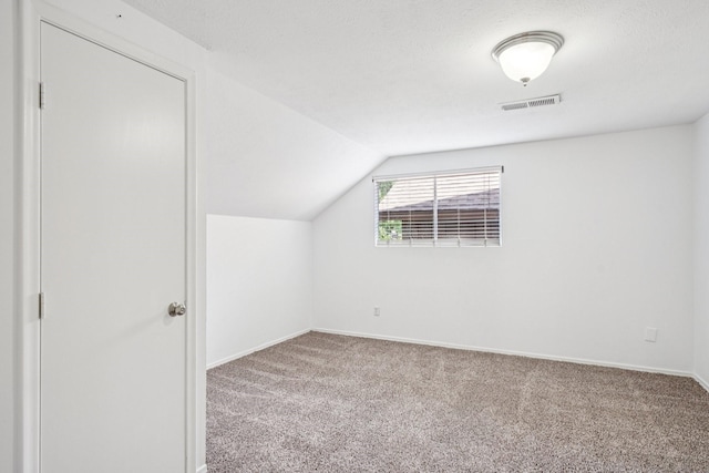 4016 Willow Ridge Dr, Dallas, TX 75244 - additional living space featuring carpet floors, lofted ceiling, and baseboards