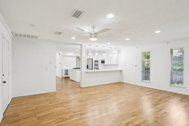 4016 Willow Ridge Dr, Dallas, TX 75244 - unfurnished living room featuring ceiling fan, recessed lighting, light wood finished floors, and baseboards