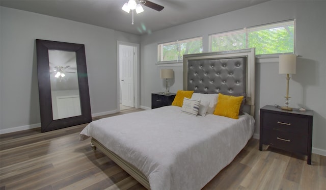 3404 Alhambra Dr, Forest Hill, TX 76119 - bedroom with wood finished floors, baseboards, and a ceiling fan