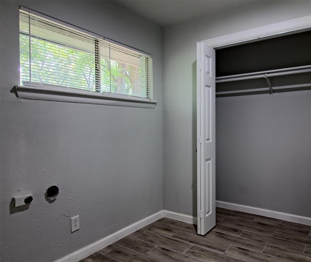 3404 Alhambra Dr, Forest Hill, TX 76119 - unfurnished bedroom with multiple windows, dark wood-style floors, a closet, and baseboards