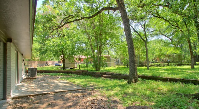 3404 Alhambra Dr, Forest Hill, TX 76119 - view of yard with a patio area and central air condition unit