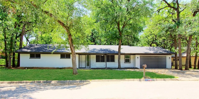 3404 Alhambra Dr, Forest Hill, TX 76119 - single story home with a garage, driveway, and a front yard